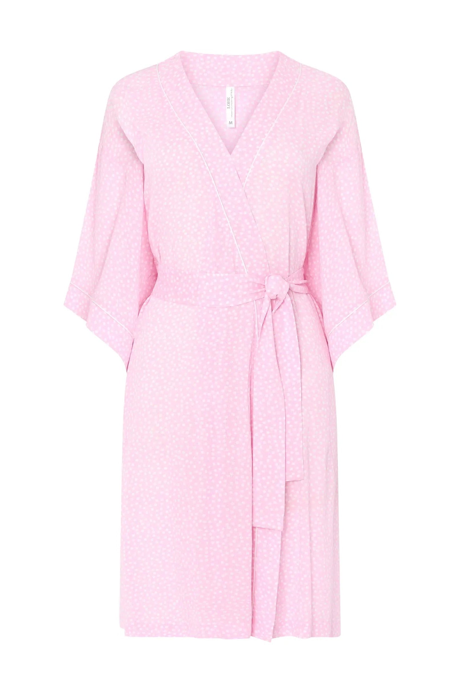 Bata corta de mujer jacquard viscosa
rosa a topitos, vivo en cuello, bolsillos laterales, cinturón y manga francesa - Rosa