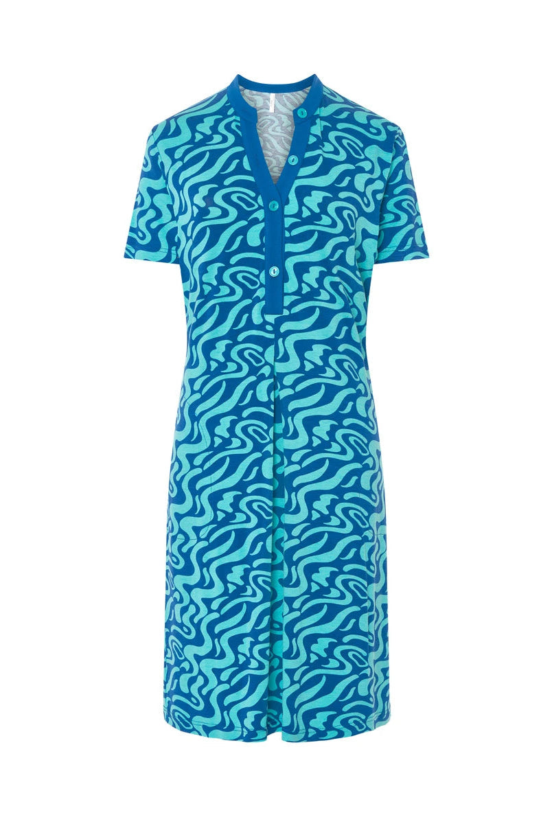 Vestido de baño corto de manga corta en punto azul con estampado ondas, cuello abierto con pata y bolsillos laterales