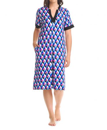 Woman in short summer beach dress with short sleeves and diamond print
