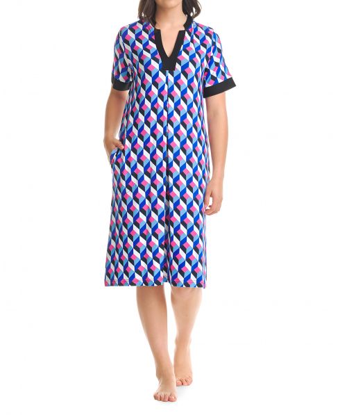 Woman in short summer beach dress with short sleeves and diamond print