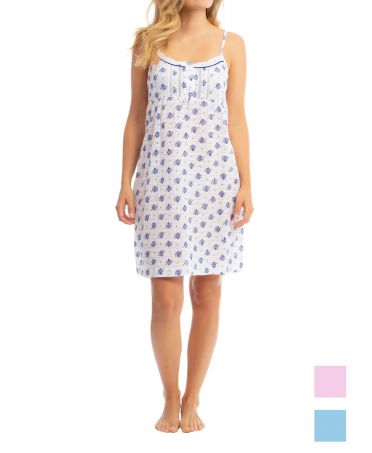 Woman in LOHE short strapless nightdress with blue floral print