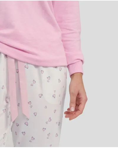 Women's pink long sleeved pyjamas with cuffs and v-neck and matching long trousers hearts