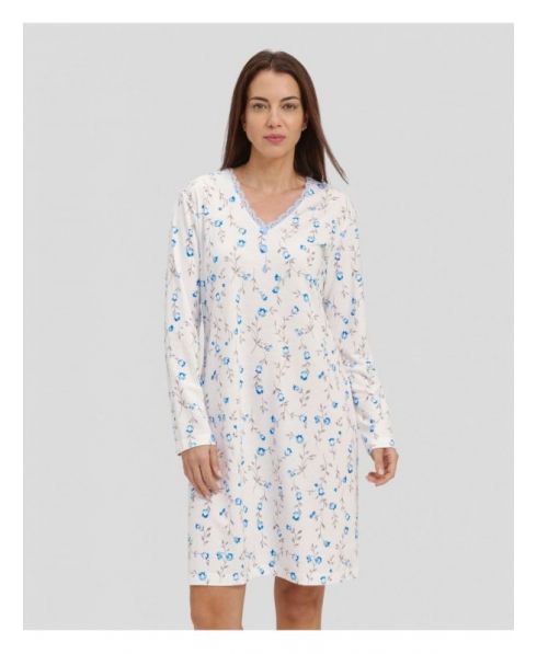 Woman with light blue flowered winter nightdress with lace collar