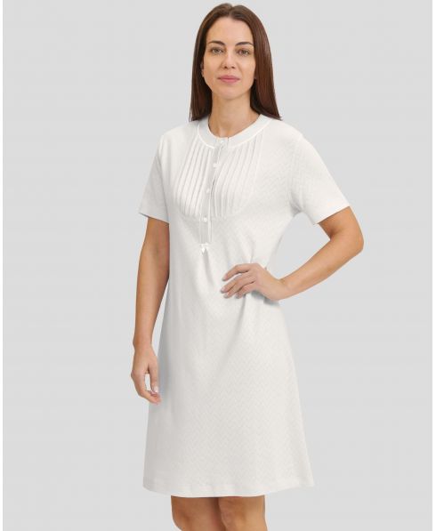 Woman in ivory lingerie nightdress with short sleeves for winter