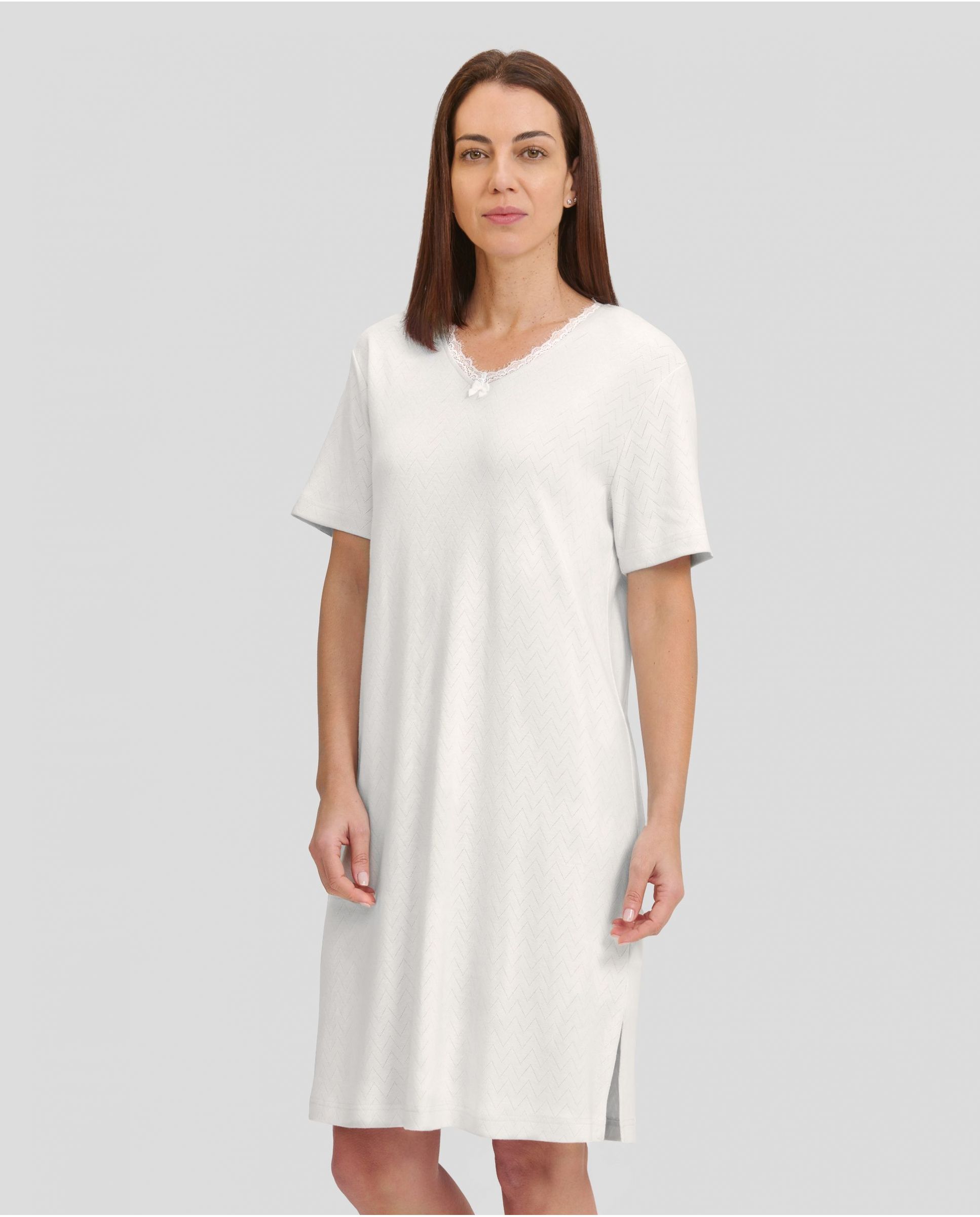 Woman in ivory short sleeve lingerie nightgown