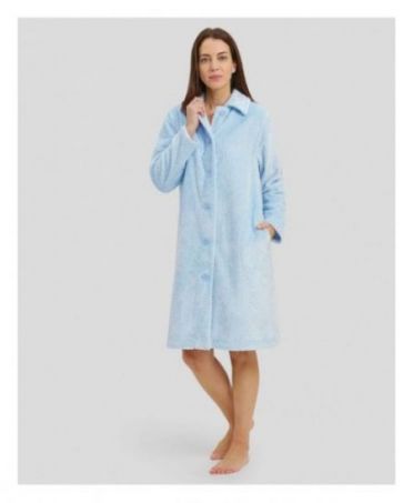 Woman with open long dressing gown with buttons and light blue side pockets