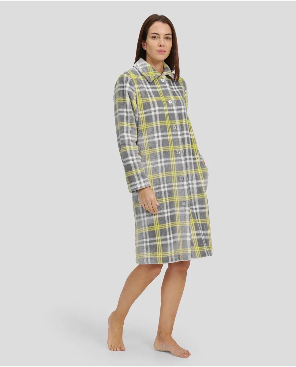 Woman in long open flannel plaid gown with side pockets