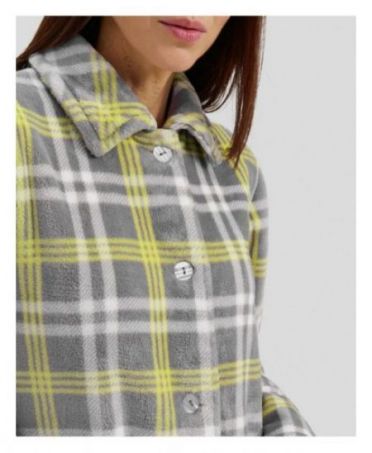 Detail view of women's grey plaid buttoned winter coat