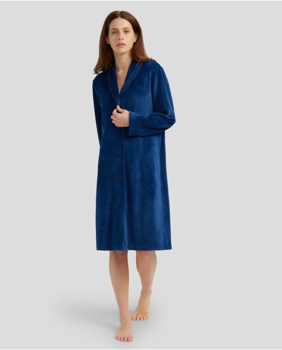 Women's long winter coat in navy velvet with buttoned pockets and button fastening