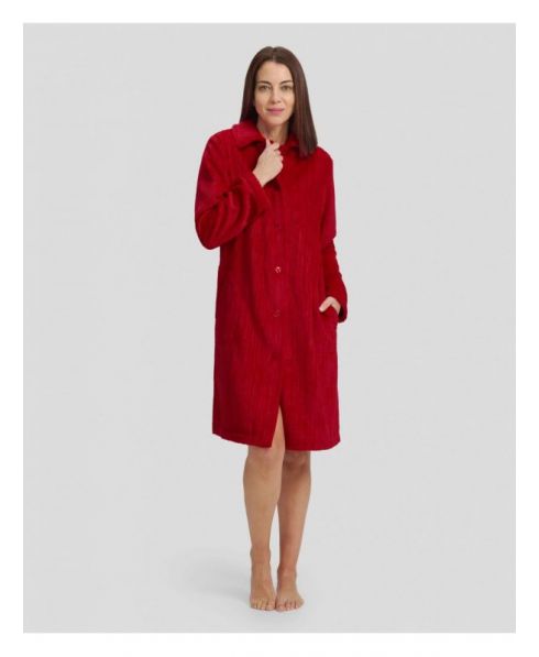 Woman in red jacquard buttoned long winter dressing gown with long buttoned pockets