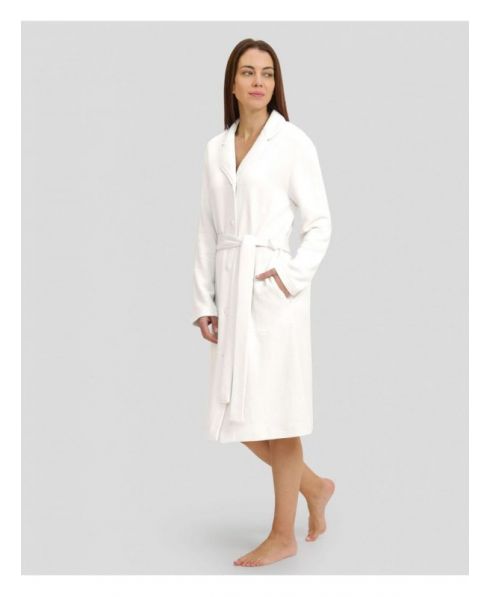 Woman in ivory winter long dressing gown with lapel collar, belt and long sleeves