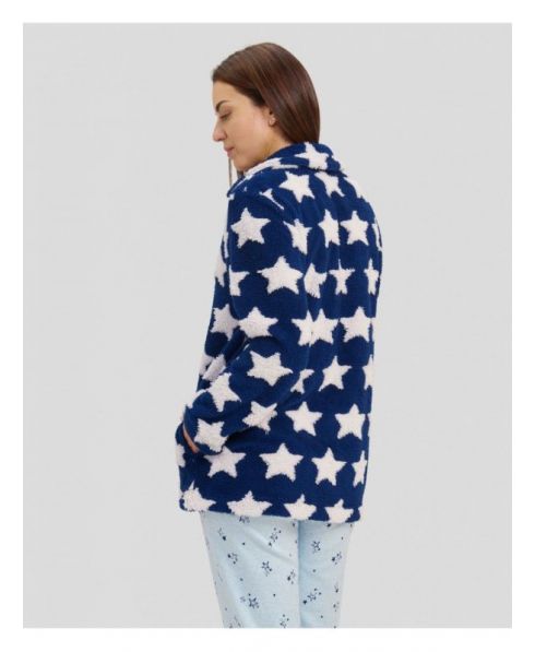 Rear view of lady's short winter coat with navy star print