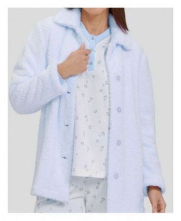 Detail view of light blue pyjamas with hearts and matching sheepskin buttoned dressing gown.