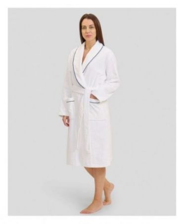 Woman in long white crossover bathrobe with piping and pockets