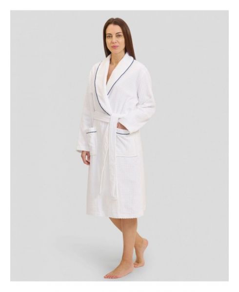 Woman in long white crossover bathrobe with piping and pockets