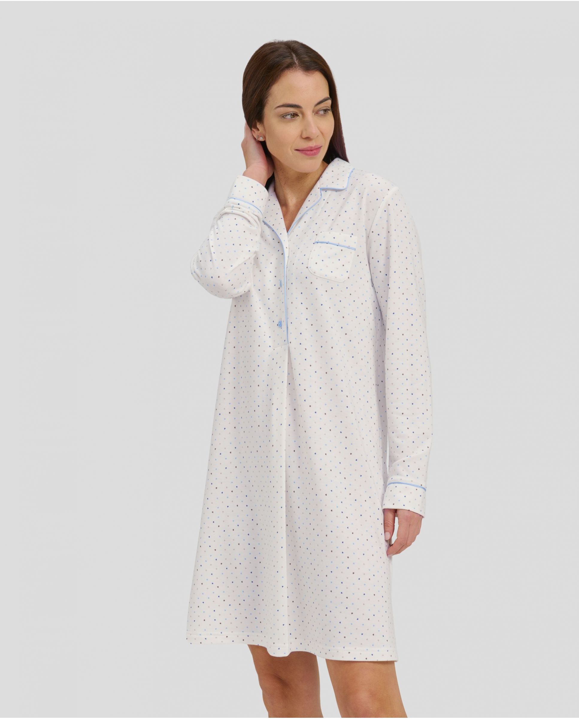 Woman in long buttoned winter nightgown for winter