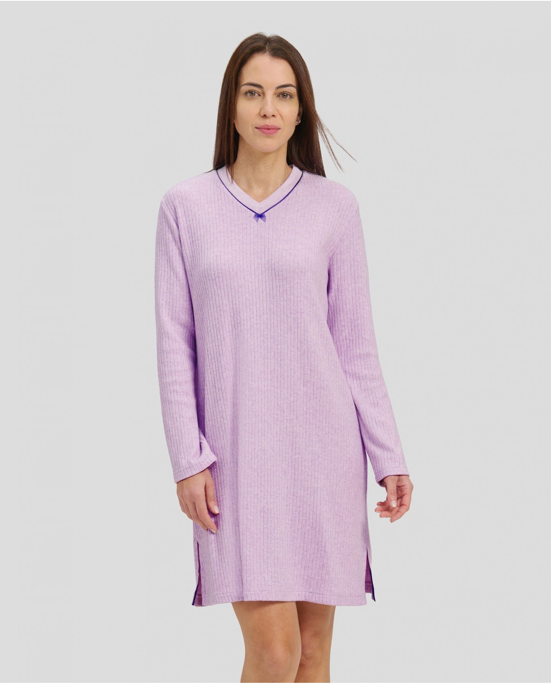 Woman in mauve long-sleeved winter nightdress with V-neck V-neck