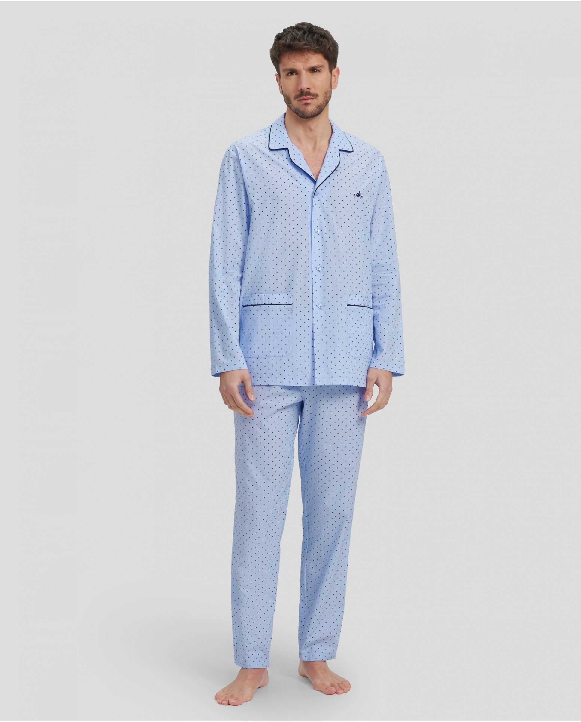 Man in long blue shirt pyjamas, collar with piped collar