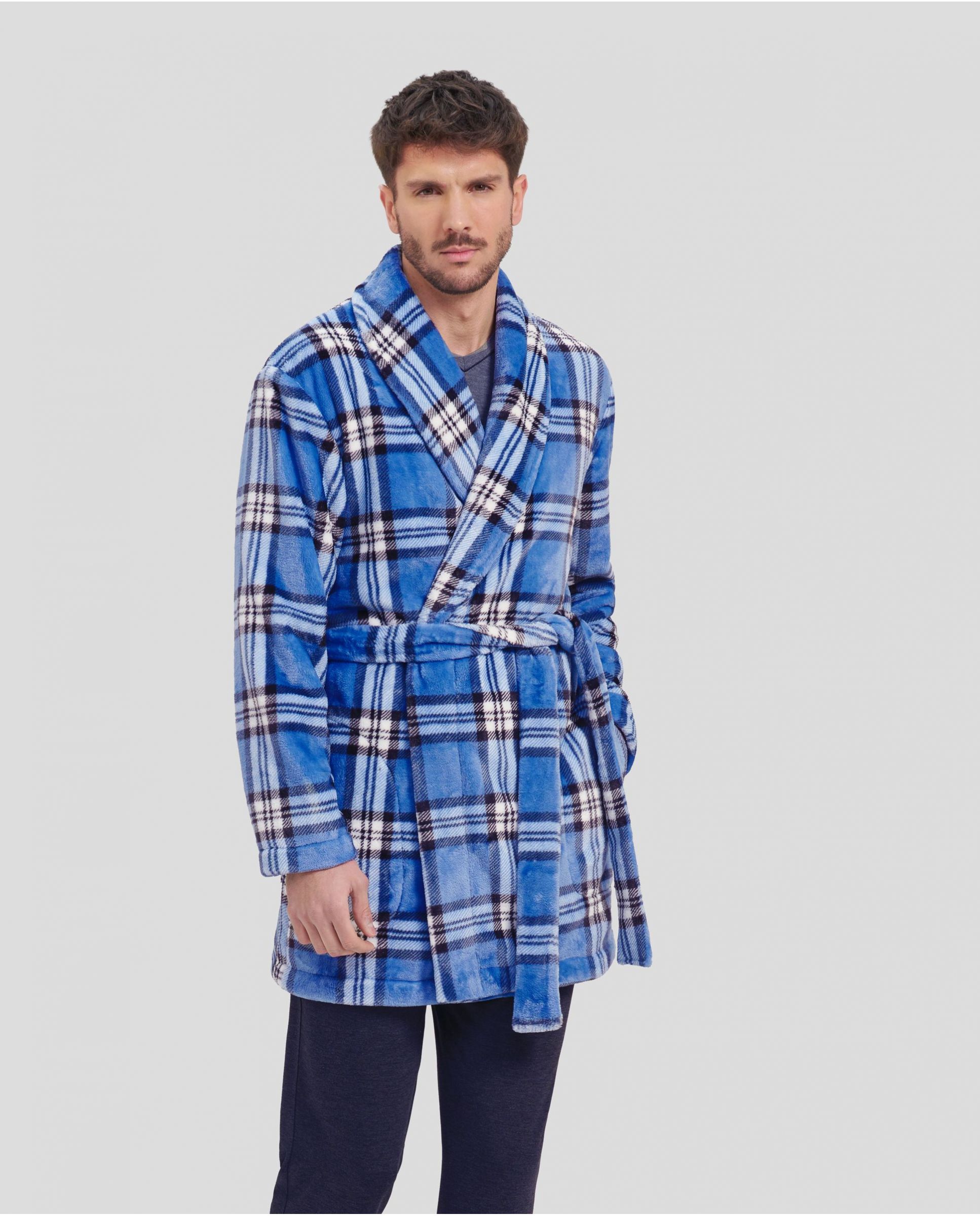 Man in short winter coat with blue checkered double-breasted coat