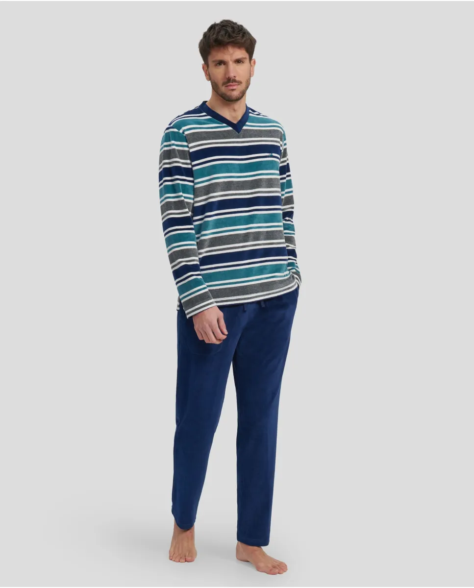 Man with long winter pyjamas in navy and green striped velvet