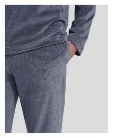 Detail view of side pocket of grey velvet pyjama trousers