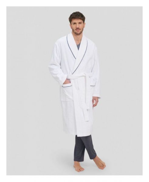 Man in white bathrobe with dinner jacket collar and blue piping and pockets