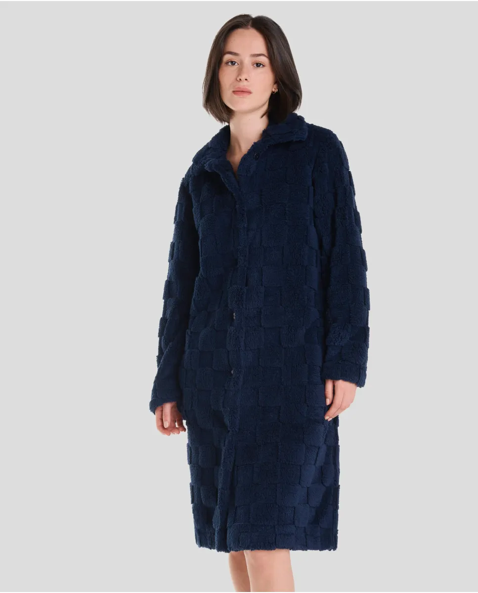 Woman in navy checkered jacquard winter long coat