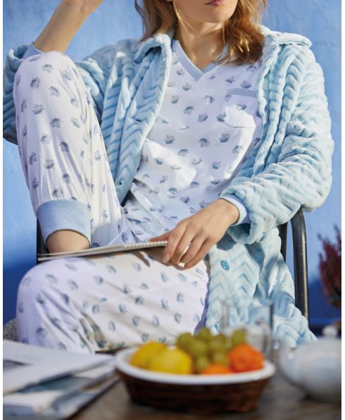 Woman in light blue Zig Zag winter short dressing gown