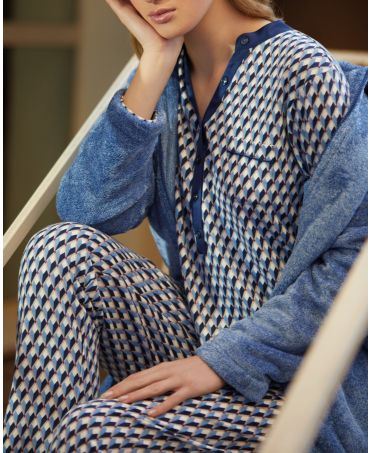 Woman in blue winter dressing gown with zip and pockets