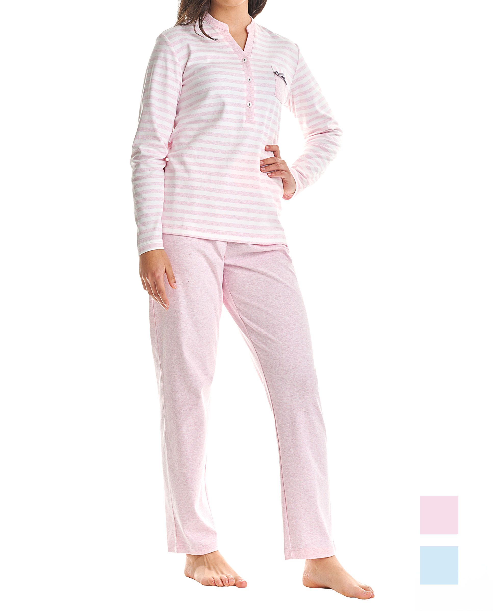 Woman in long winter pyjamas, long-sleeved striped pink printed jacket, V-neck with buttons, plain long trousers.