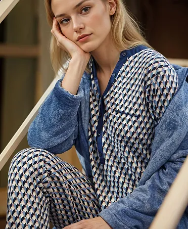 Woman in blue winter dressing gown with zip and pockets