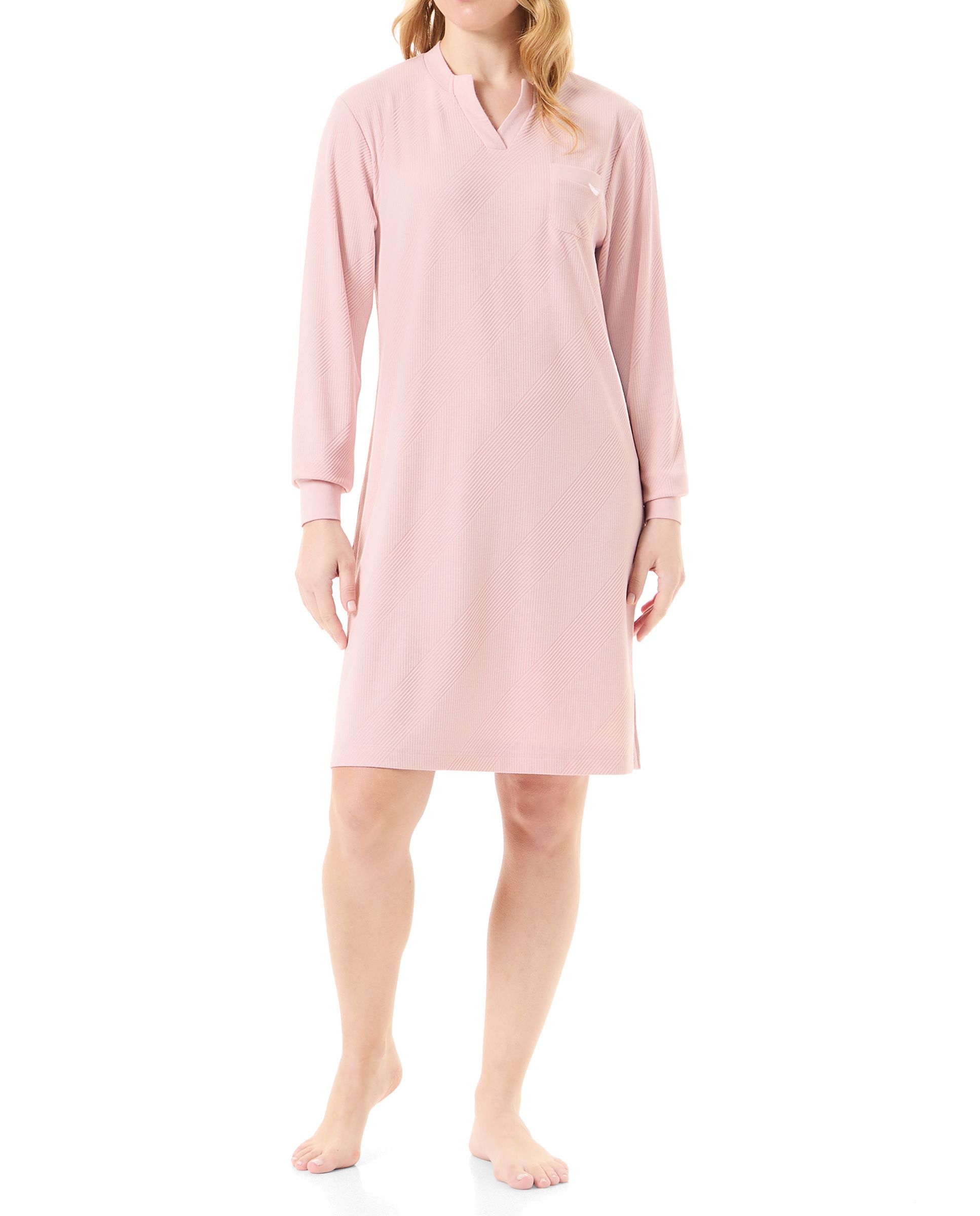 Woman with long ribbed pink nightdress embossed