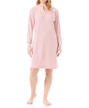 Woman with long ribbed pink nightdress embossed