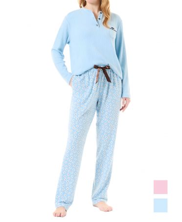 Woman in light blue mixed daisy winter pyjamas