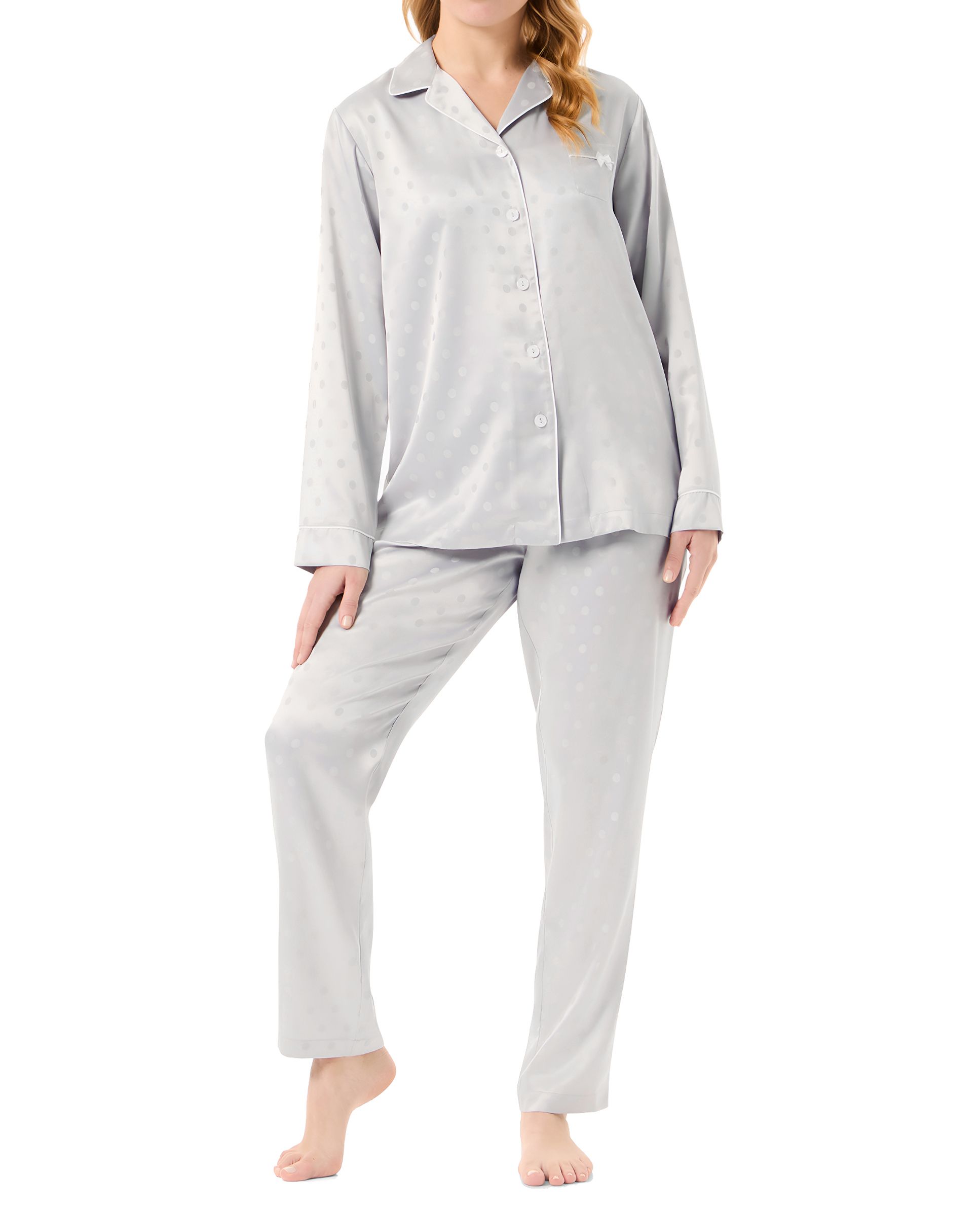 Woman in long open satin jacquard pyjamas