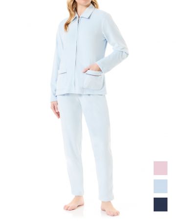 Woman in light blue velvet tracksuit open with zip and pockets