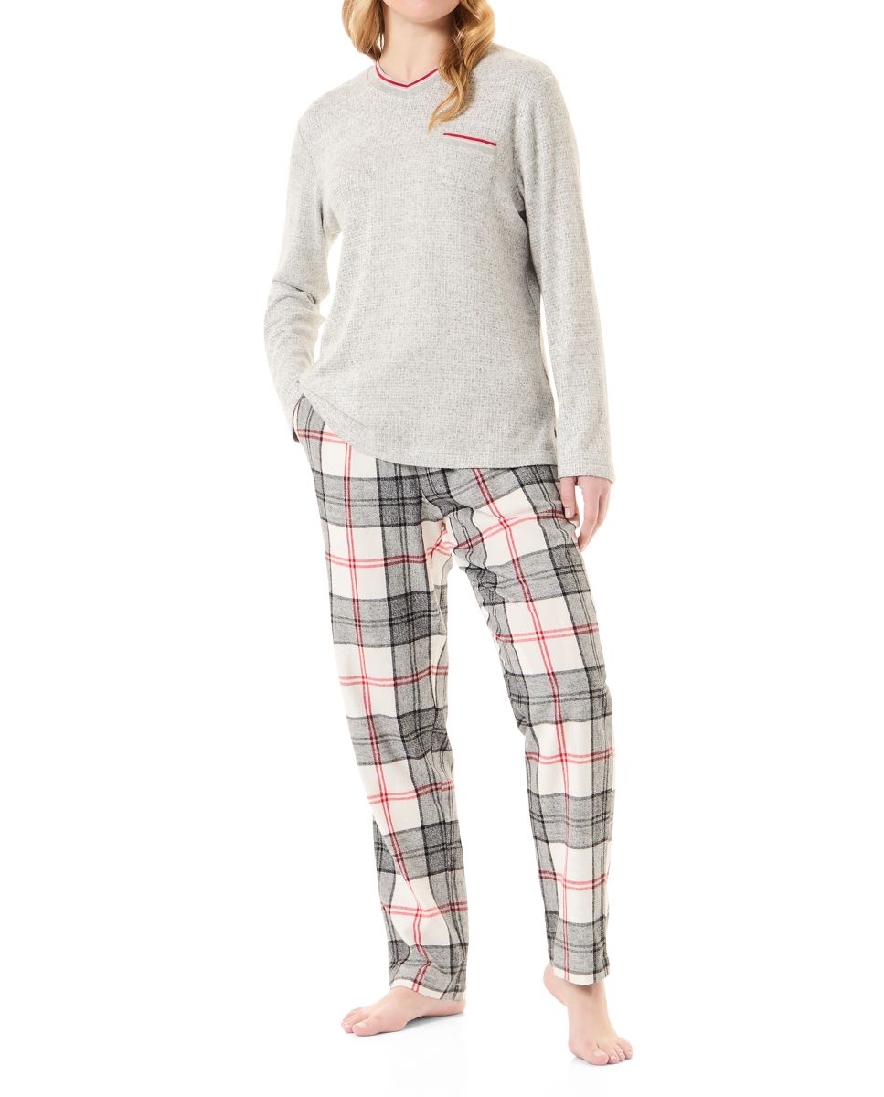 Woman in mixed checked winter pyjamas