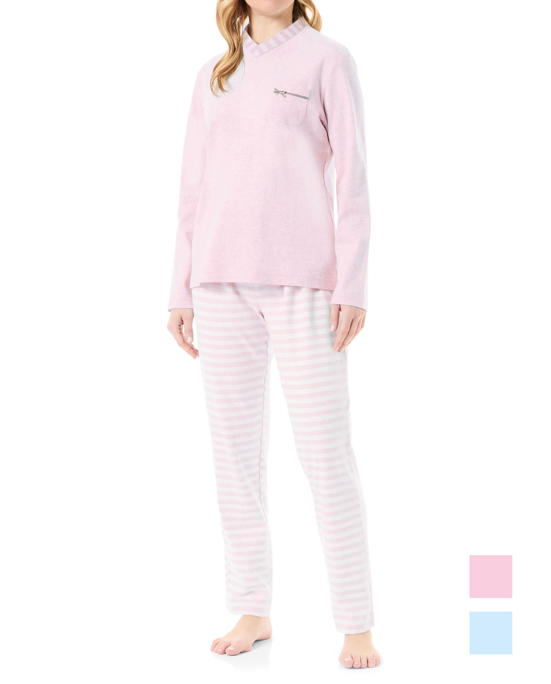 Woman wearing long pyjamas with a pink V-necked jacket, soft vigoré fabric and subtle striped details.