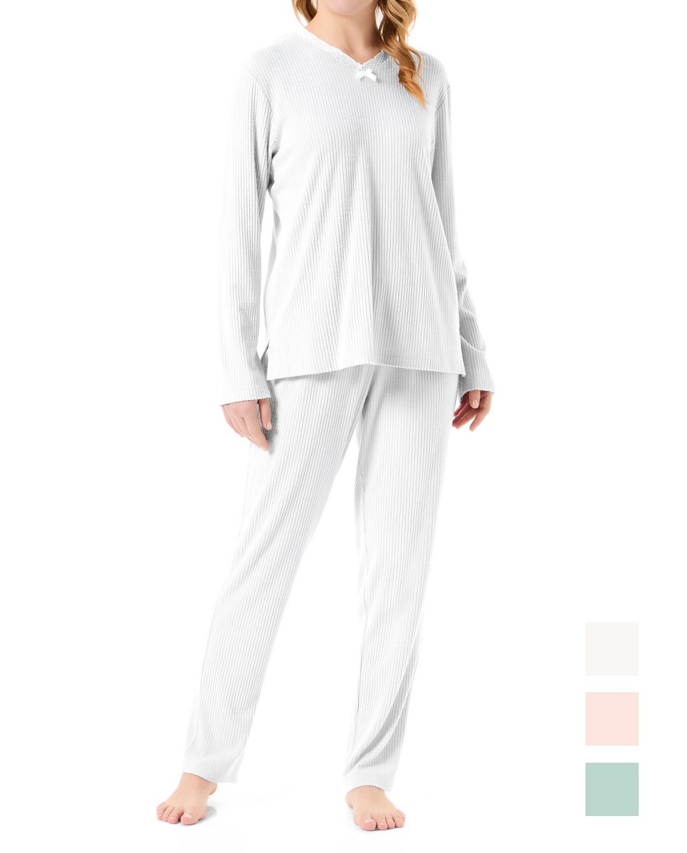 Woman in ivory long-sleeved lingerie pyjamas with lace details