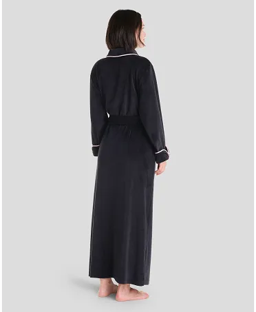 Rear view of black velvet long winter dressing gown with pockets