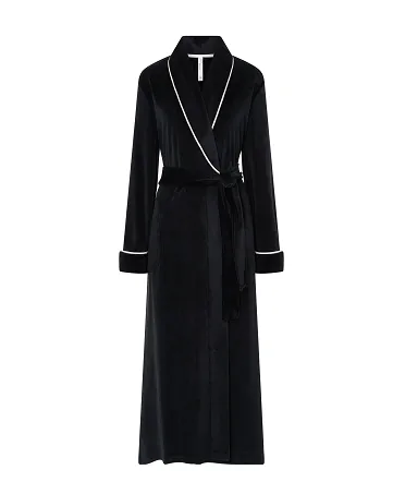 Women's long gown, velvet fabric, double breasted with piping on lapel, pockets, belt and long sleeves.