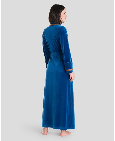 Rear view of blue long velvet women's winter coat