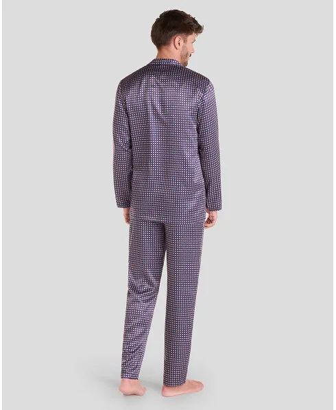 Rear view of men's satin pyjamas with navy polka dot pattern