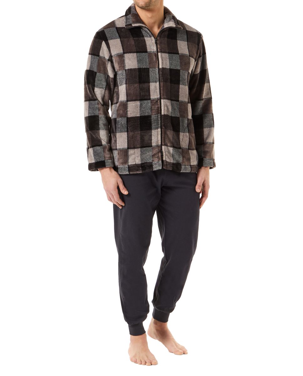 Man in short checked flannel coat with zip fastening