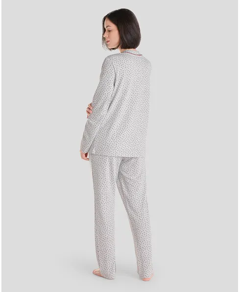 Rear view of woman in grey winter pyjamas with long sleeves