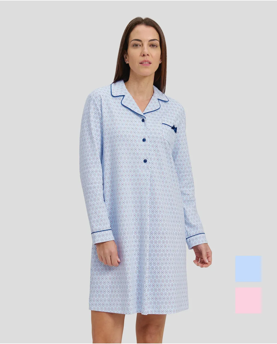 Woman in light blue oval winter long nightdress with open collar with blue buttons and piping