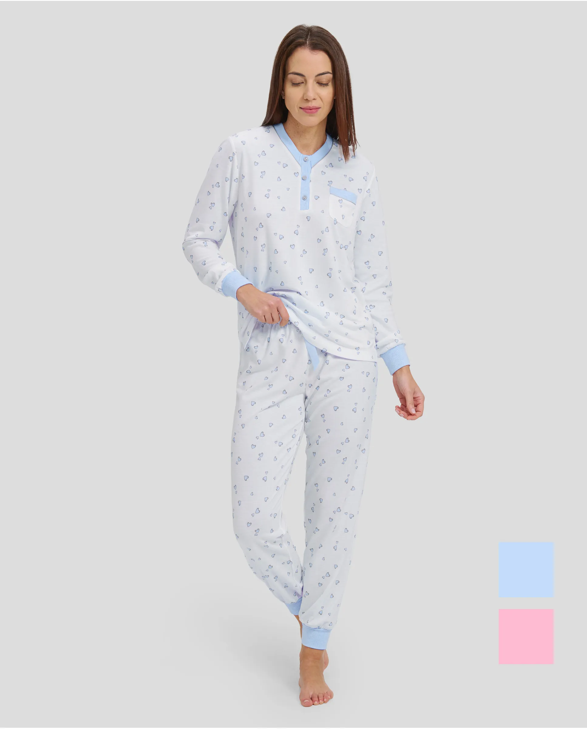 woman with long winter pyjamas with light blue heart print