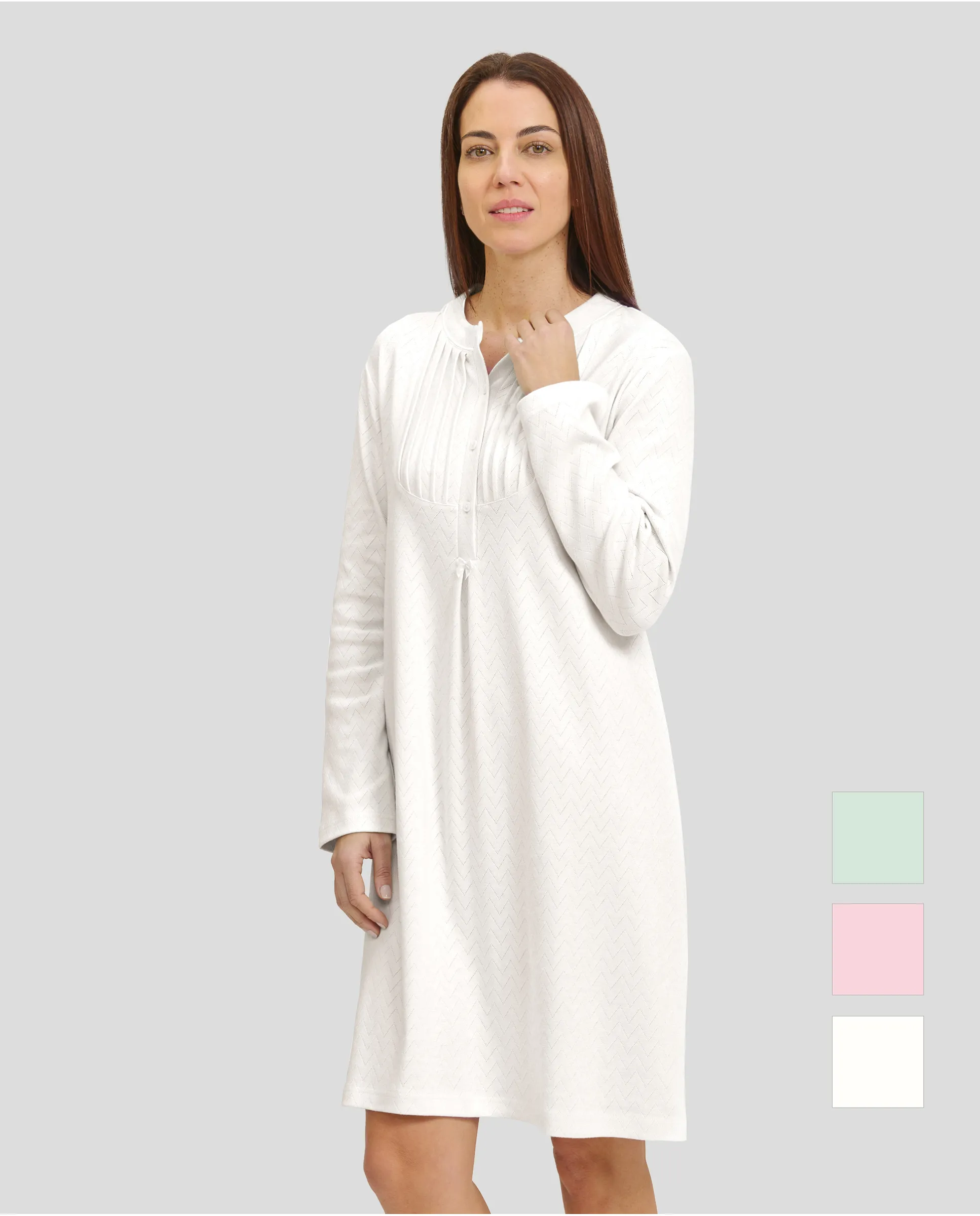 Woman in ivory long-sleeved nightgown for winter with louvres