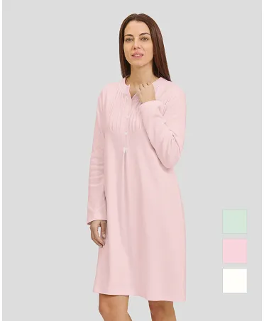 Woman in pink long-sleeved nightgown for winter with lorzas