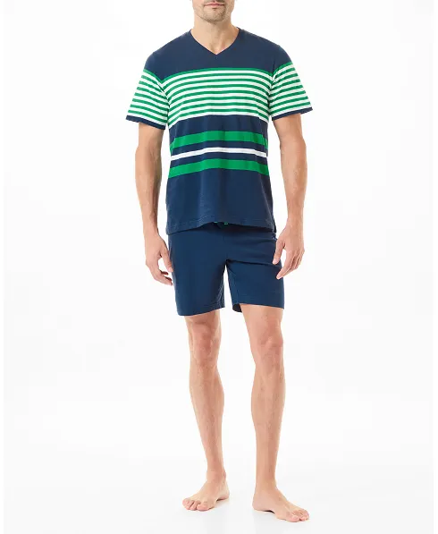 A man wearing summer pyjamas with a navy striped T-shirt and shorts.